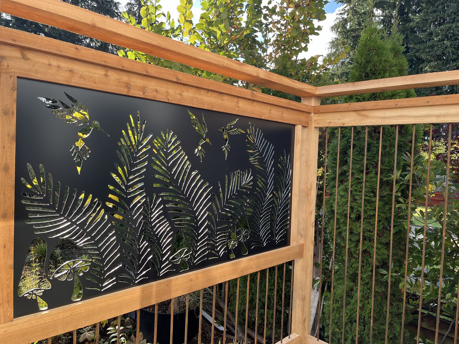 Decorative fern screen set into a cedar frame